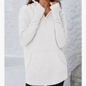 Women's White Ribbed Turtleneck Sweater with front pocket to keep hands warm
